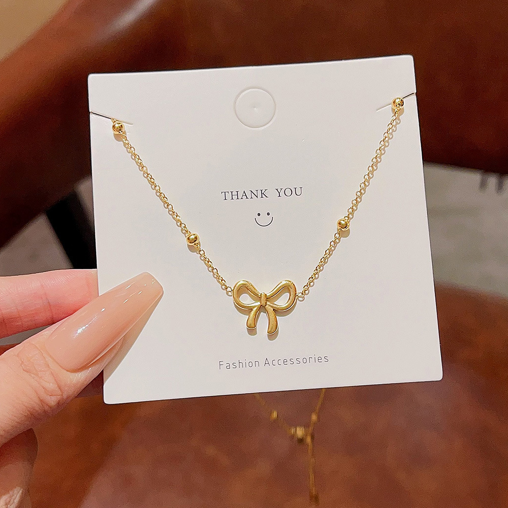 New bow titanium steel necklace Women's Light luxury high-grade all-match Non-fading 18K gold sweet ins style clavicle chain
