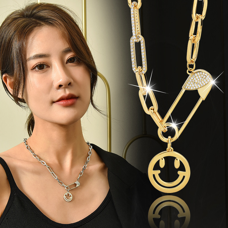European and American high-grade titanium steel paper clip autumn and winter necklace women's pin hanging smiley face pendant clothing clothing sweater chain wholesale