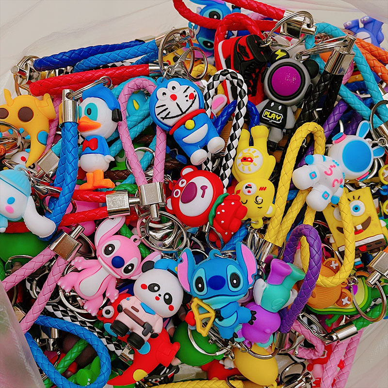 Cartoon pvc soft rubber doll key chain woven rope tide play gift car key accessories mixed doll wholesale