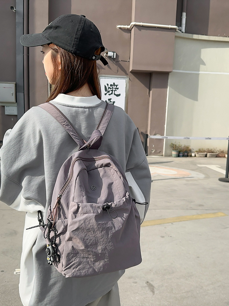 Large Capacity Backpack 2025 Summer New Lightweight Nylon Bag Casual Male and Female Middle School Student Bag Travel Backpack