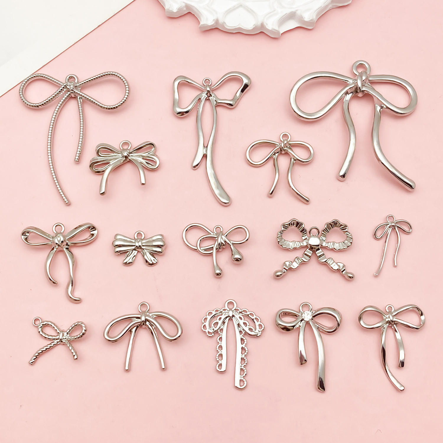 Mixed 15 White K Color Bow Hollow Alloy Pendant DIY Simple High Sense Necklace Pendant Accessories