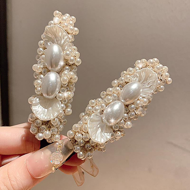 South Korea fashion pearl petal hairpin retro fashion high sense duckbill clip new niche Joker hair accessories wholesale