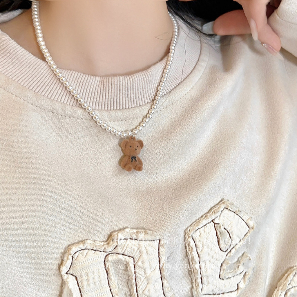 Japanese and Korean-style sweet cute flocking bear pearl necklace jewelry women's simple high-grade titanium steel non-fading sweater chain