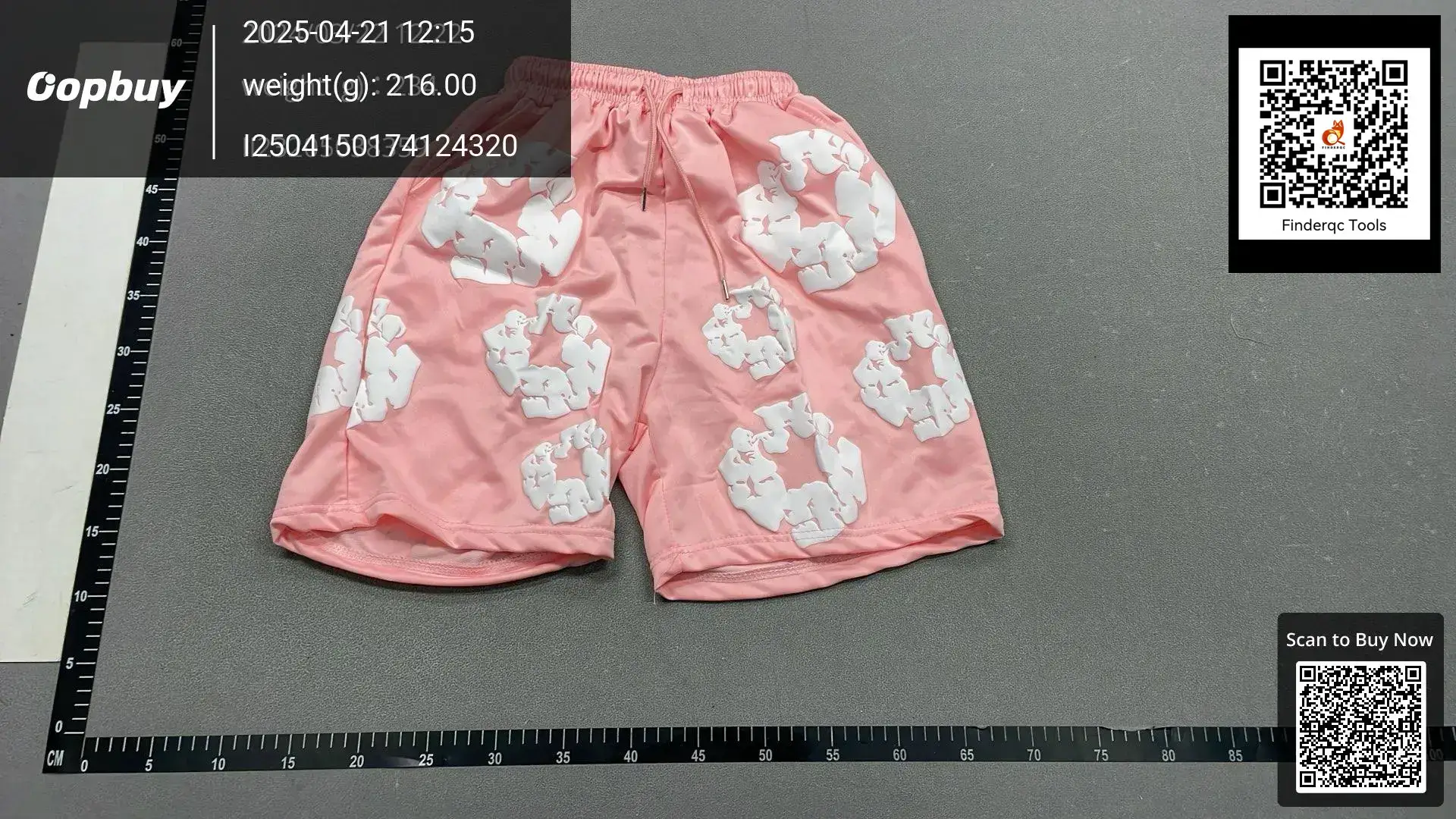 Pink shorts with white graphic print