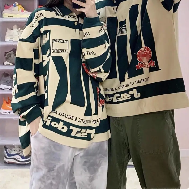 Europe and the United States CPFM co-branded paragraph retro sports trend men and women letter printing color collision loose Polo long-sleeved sweater