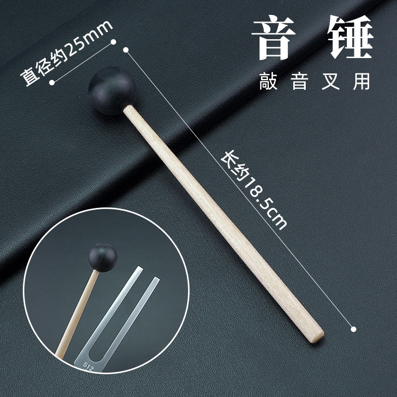 tuning fork with hammer professional ear picking tools tuning fork accessories tapping tuning fork with a small hammer hand holding a small hammer tapping