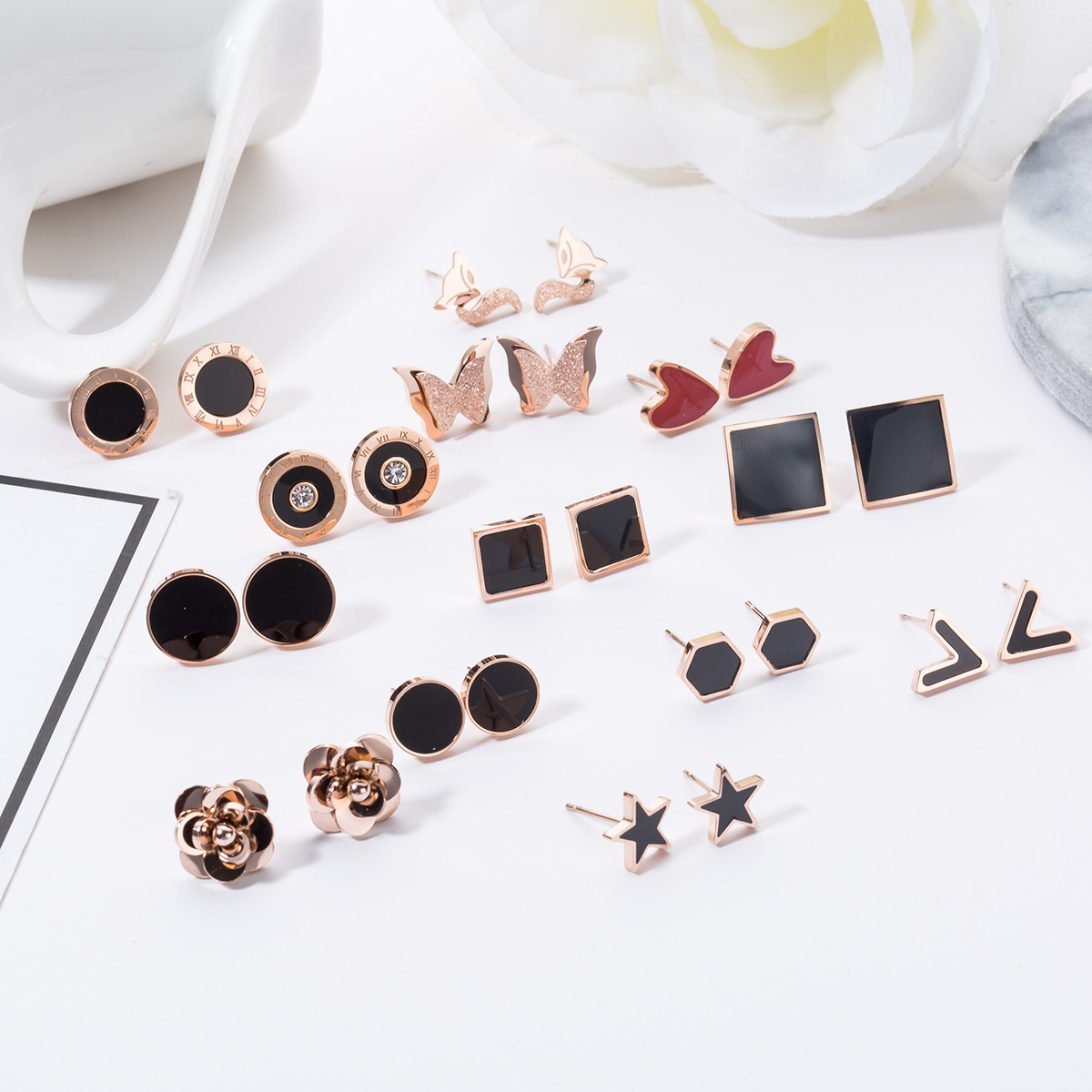 New creative titanium steel earrings female zircon series geometric earrings women's non-fading rose gold trinket hair