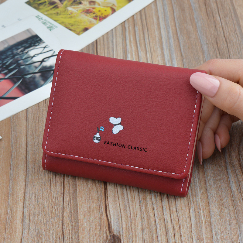 New wallet women's short wallet female student fashion Japanese and Korean large capacity folding soft wallet mini wallet