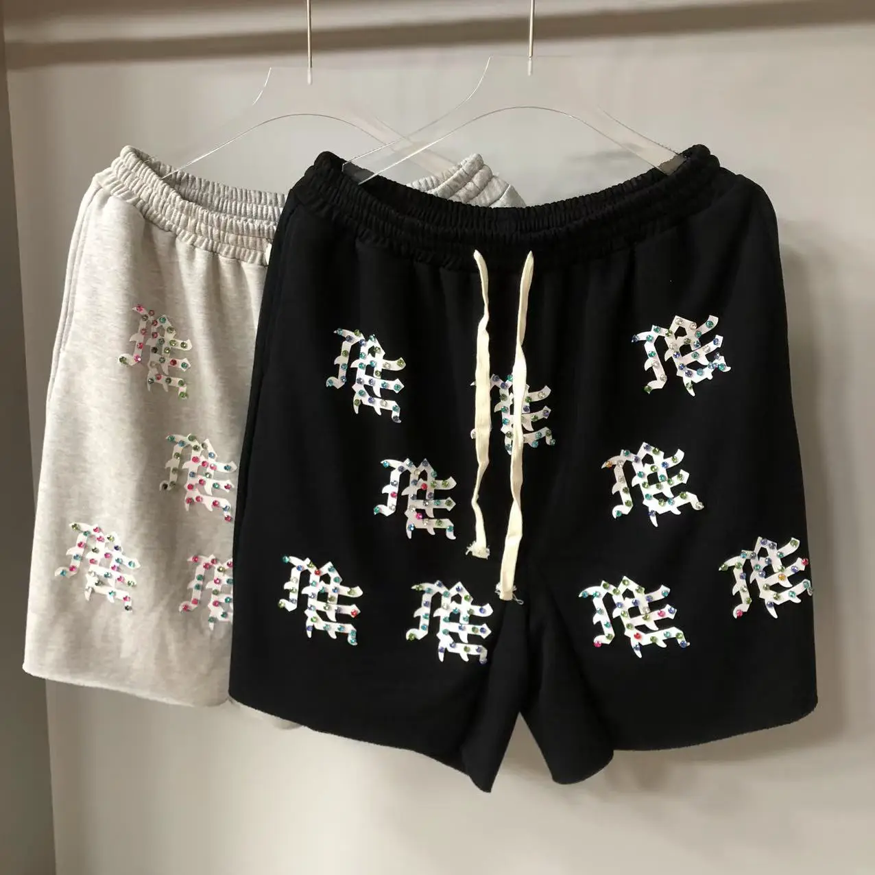 2025 Spring and Summer New Mix Hot Diamond Full Printed Letters Casual Loose Shorts for Men and Women, One Piece Wholesale