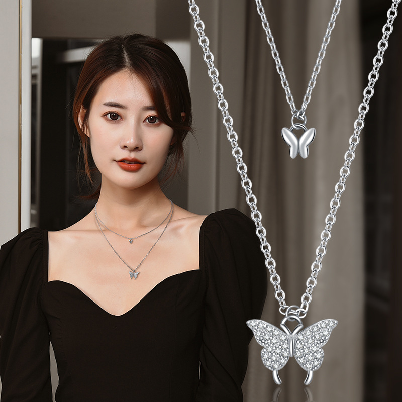 Factory direct titanium steel Double Butterfly necklace female Korean full diamond butterfly clavicle chain temperament simple accessories wholesale