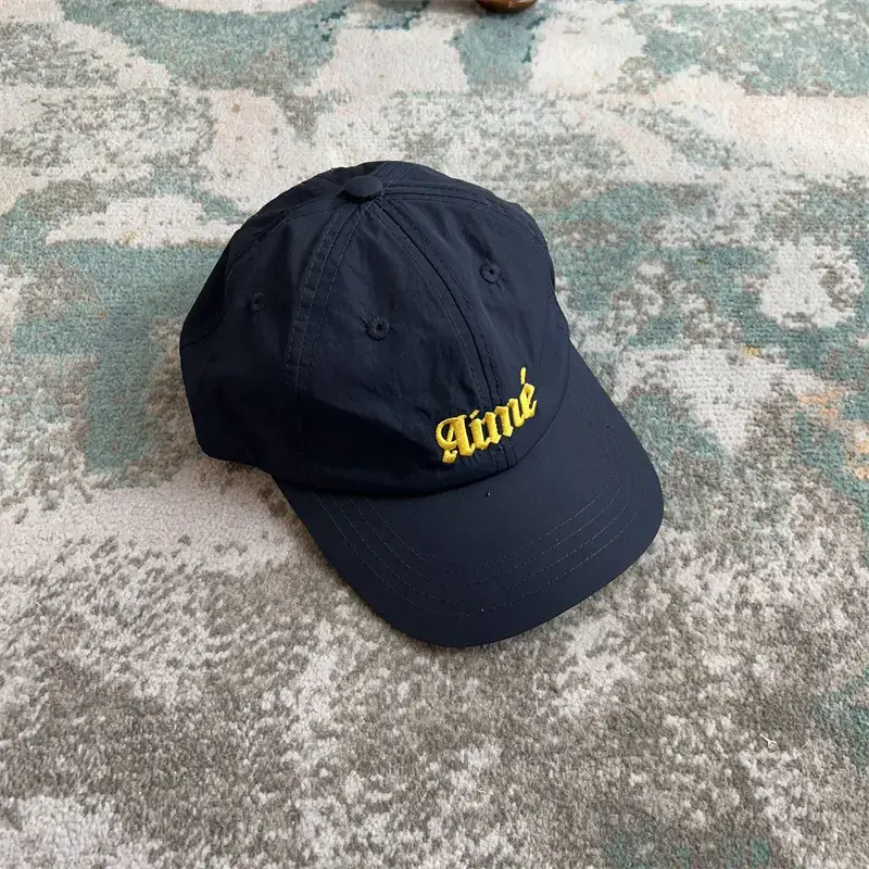 Aime Navy Curved Brim Peaked Cap
