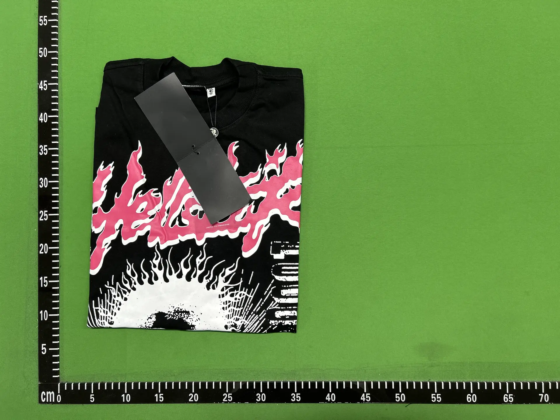 Black T-shirt with pink flame graphic