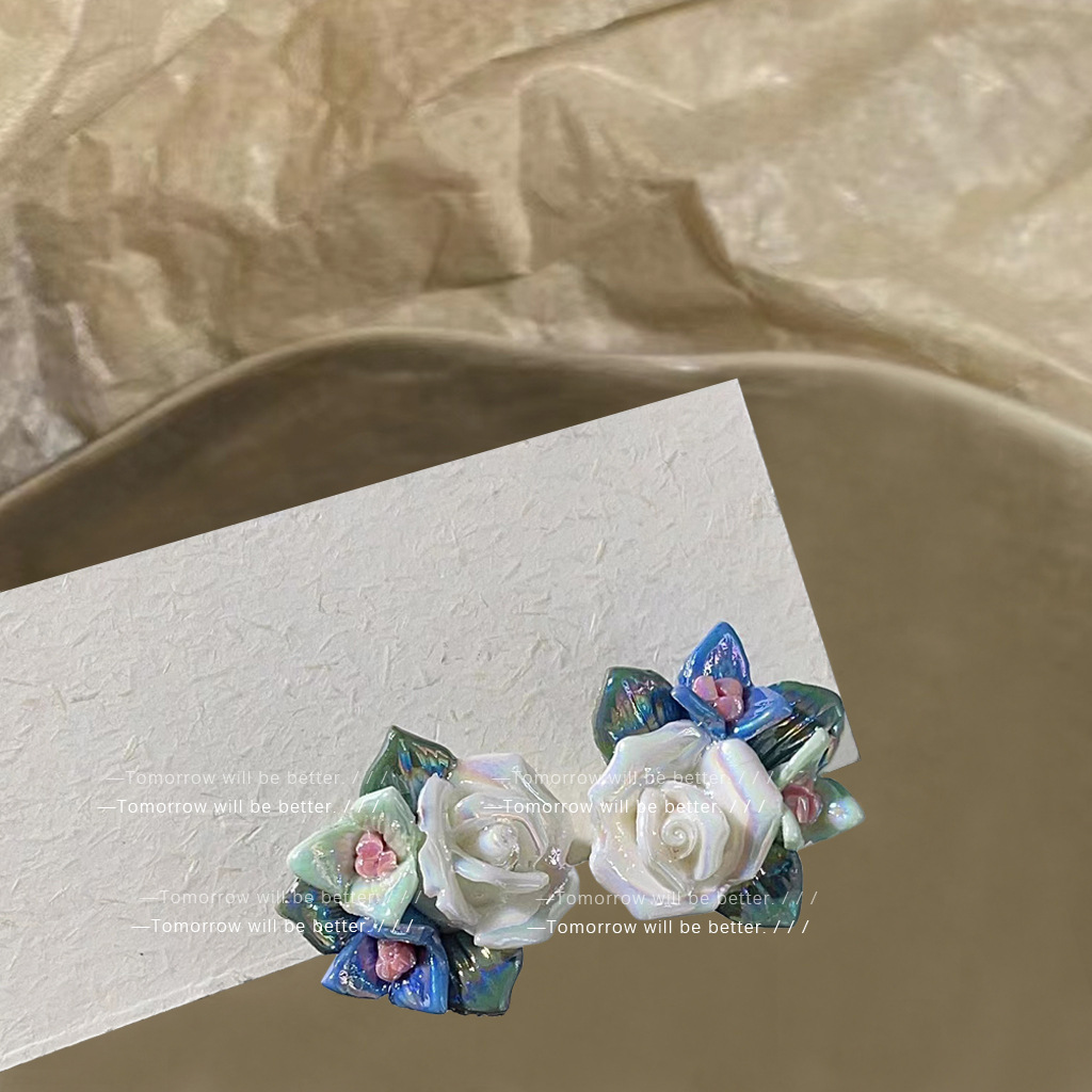Artistic ceramic flower earrings female Japanese and Korean sweet girl heart Tea Series niche high-end earrings silver needle wholesale