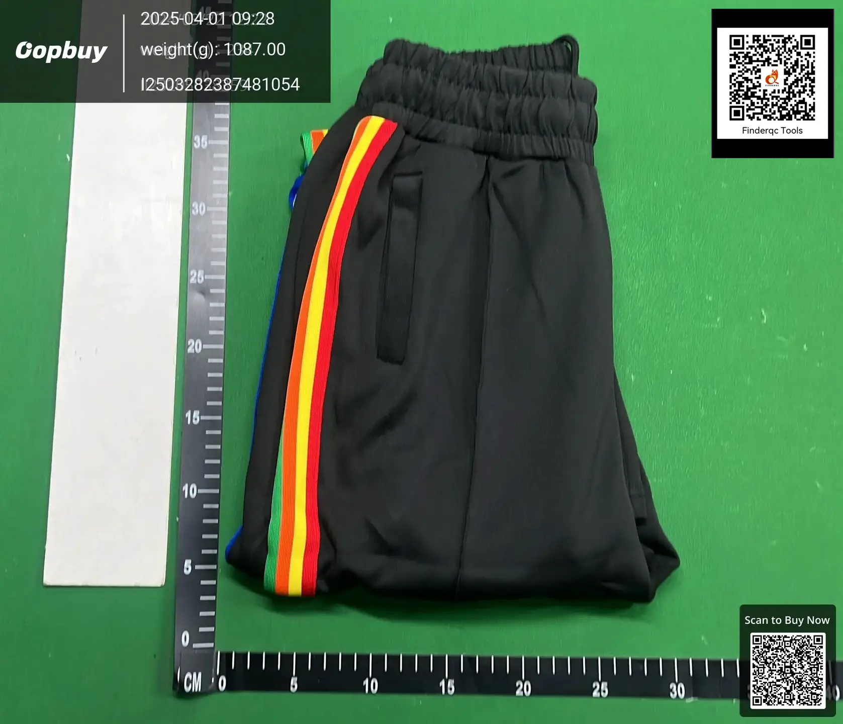 Black track pants with rainbow stripe