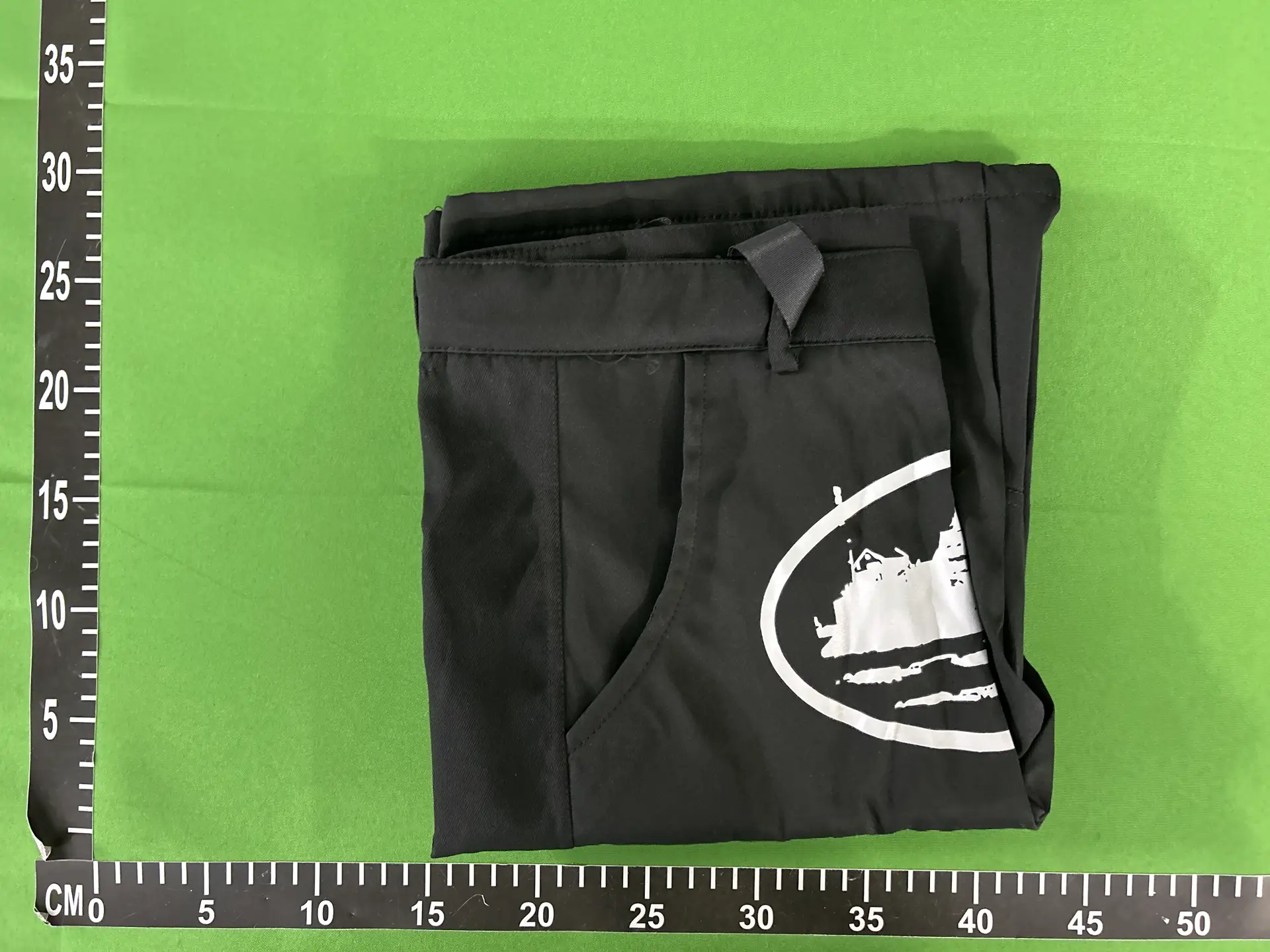 Black shorts with white logo