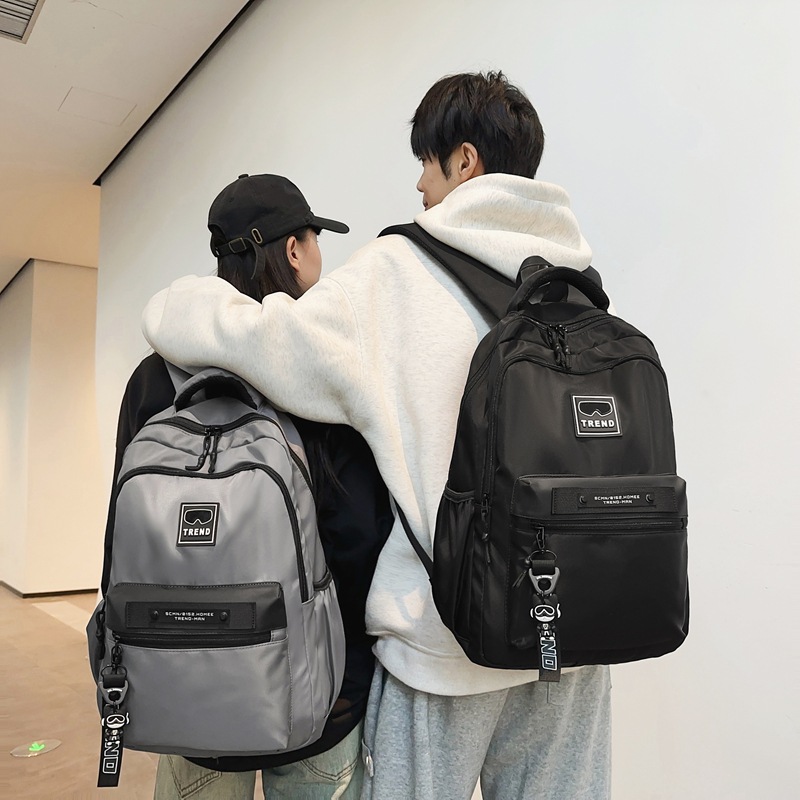 New Trendy Brand Large-Capacity Schoolbags for Men and Women, Simple Casual Travel Backpacks, High-End Commuter Backpacks