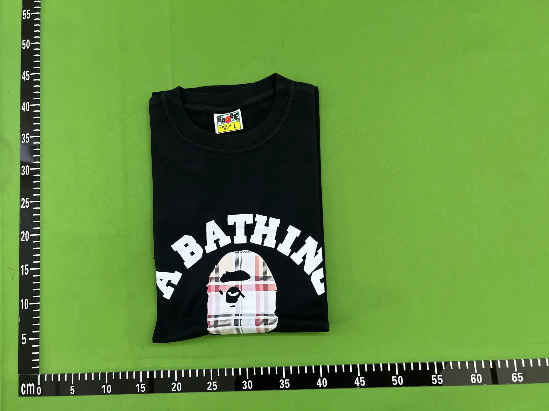 A Bathing Ape Black T-Shirt with Plaid Ape Head Logo