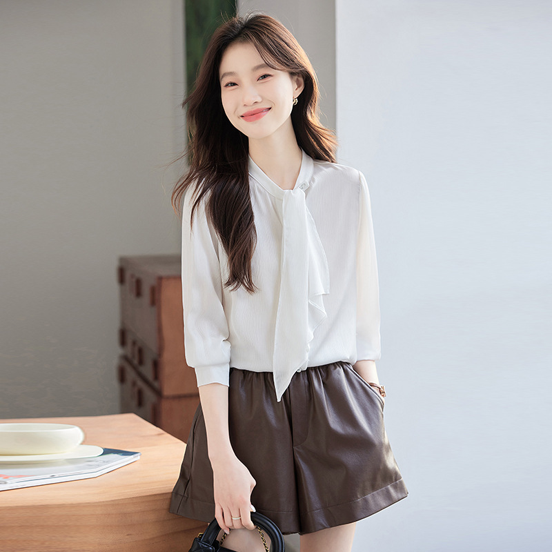 apricot shirt female design sense niche 2025 new spring and autumn professional temperament high-end long sleeve fashion ribbon shirt