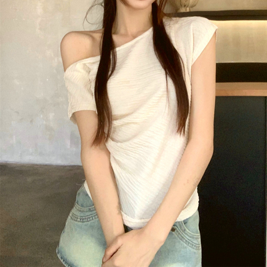 Real Shot of a French-Style Textured Pleated T-Shirt for Women, Featuring a Unique Design, Slim Fit, Off-Shoulder Neckline, and Short Length That Highlights the Collarbone