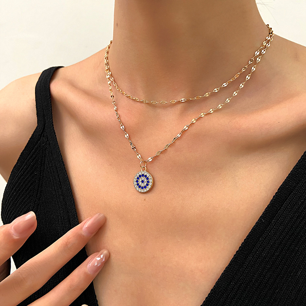 European and American cross-border gold-plated Devil's Eye double-layer necklace fashion personality alloy pendant vintage sweater chain wholesale female