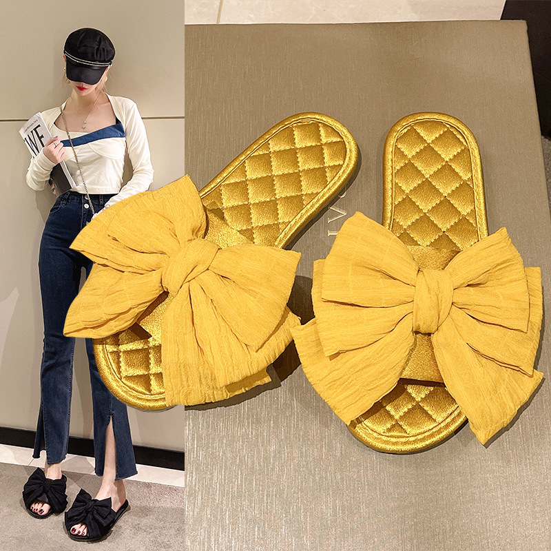 Korean version of silk and satin ladies simple bow fashion Joker can wear non-slip home indoor slippers a generation of hair