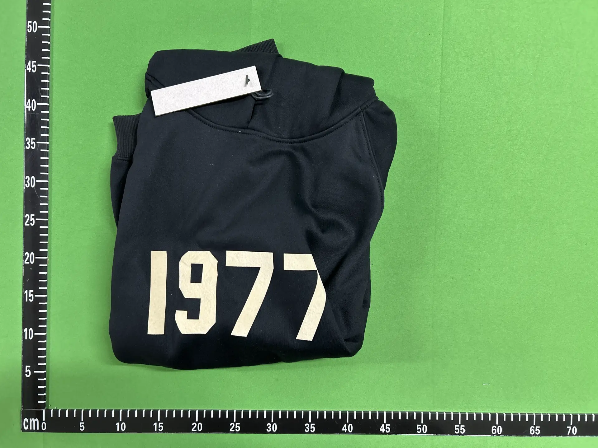 Black hoodie with 1977 graphic