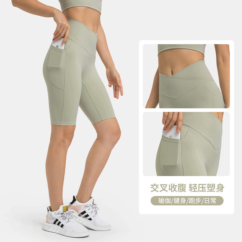 A generation of new waist cross umbilical stretch yoga pants side pocket stretch hip fitness pants