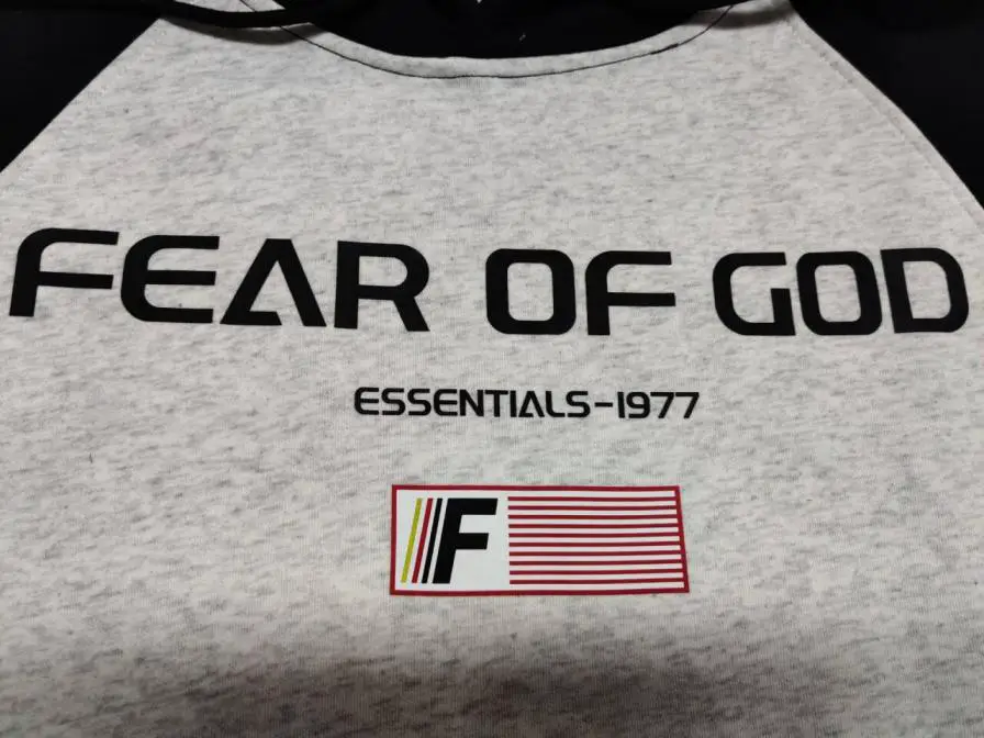 Fear of God Essentials 1977 Grey Raglan Hoodie