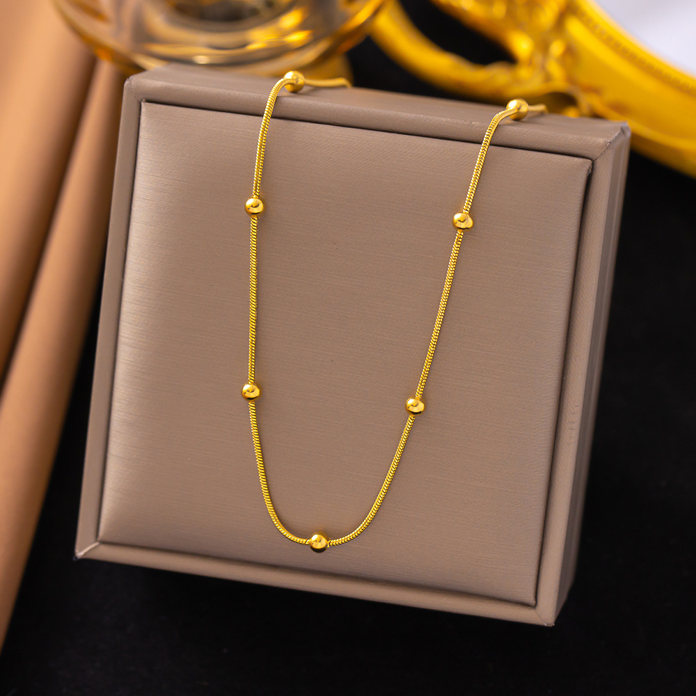 Europe and the United States cross-border wholesale Japan and South Korea simple titanium steel necklace ins transfer beads snake chain gold beans niche high-end jewelry