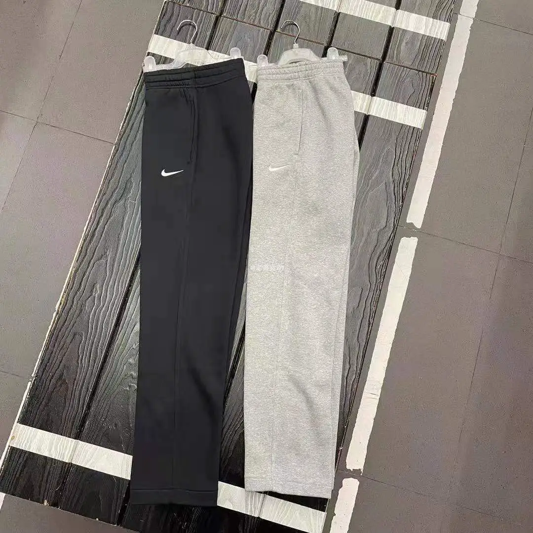 Genuine Nike Nike fall and winter men's sports and leisure loose straight knitted padded warm pants 916274
