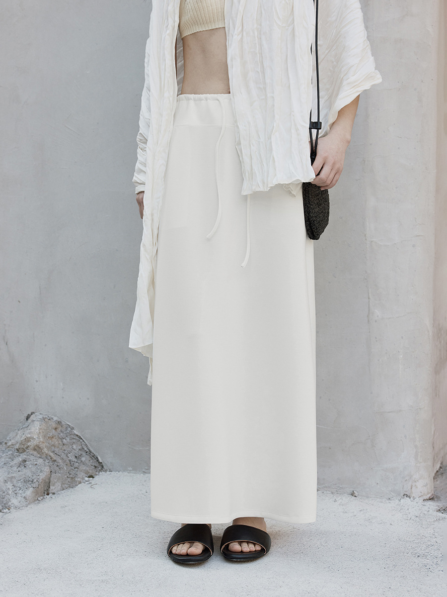 Love and Nancy Thirteen Lines 2026 Spring/Summer Korean Solid Color High Waist Drawstring High-End Slimming A-Line Skirt 04118