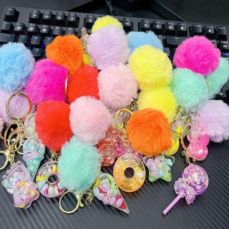 Acrylic oil drift bottle key chain quicksand bottle pendant jewelry to push small gift doll machine fur ball doll