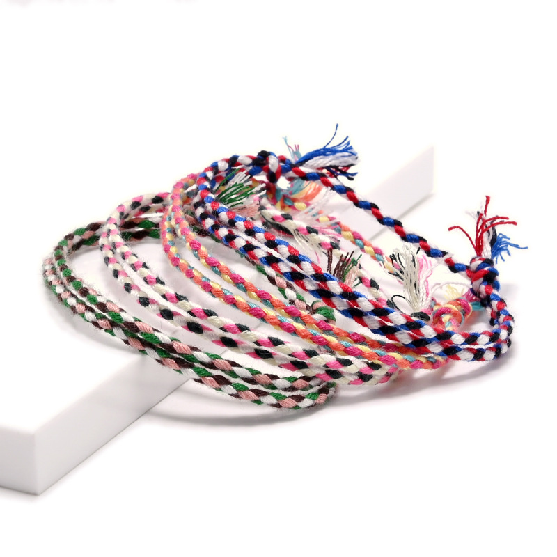 AAS Color Braided Cotton Cozy Handmade Rope Braided Bracelet Xizang Lucky Hand Rope Tassel Friendship Rope Bracelet QC-foto från 1688 på Qualit.ly