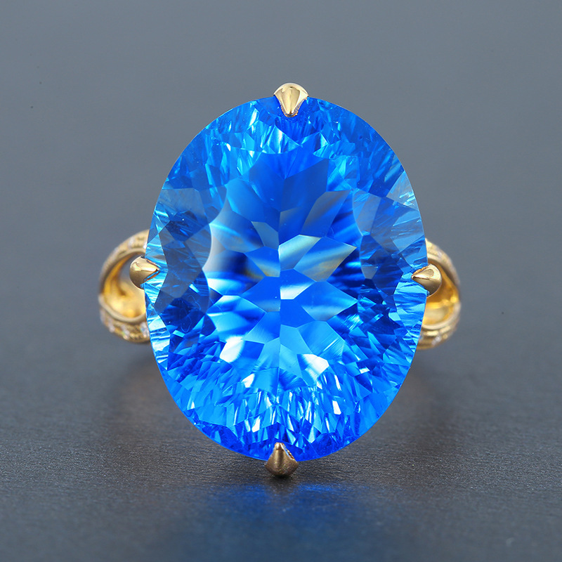 Advanced sense simple pigeon egg color treasure opening ring imitation Swiss blue oval natural Topaz ring wholesale