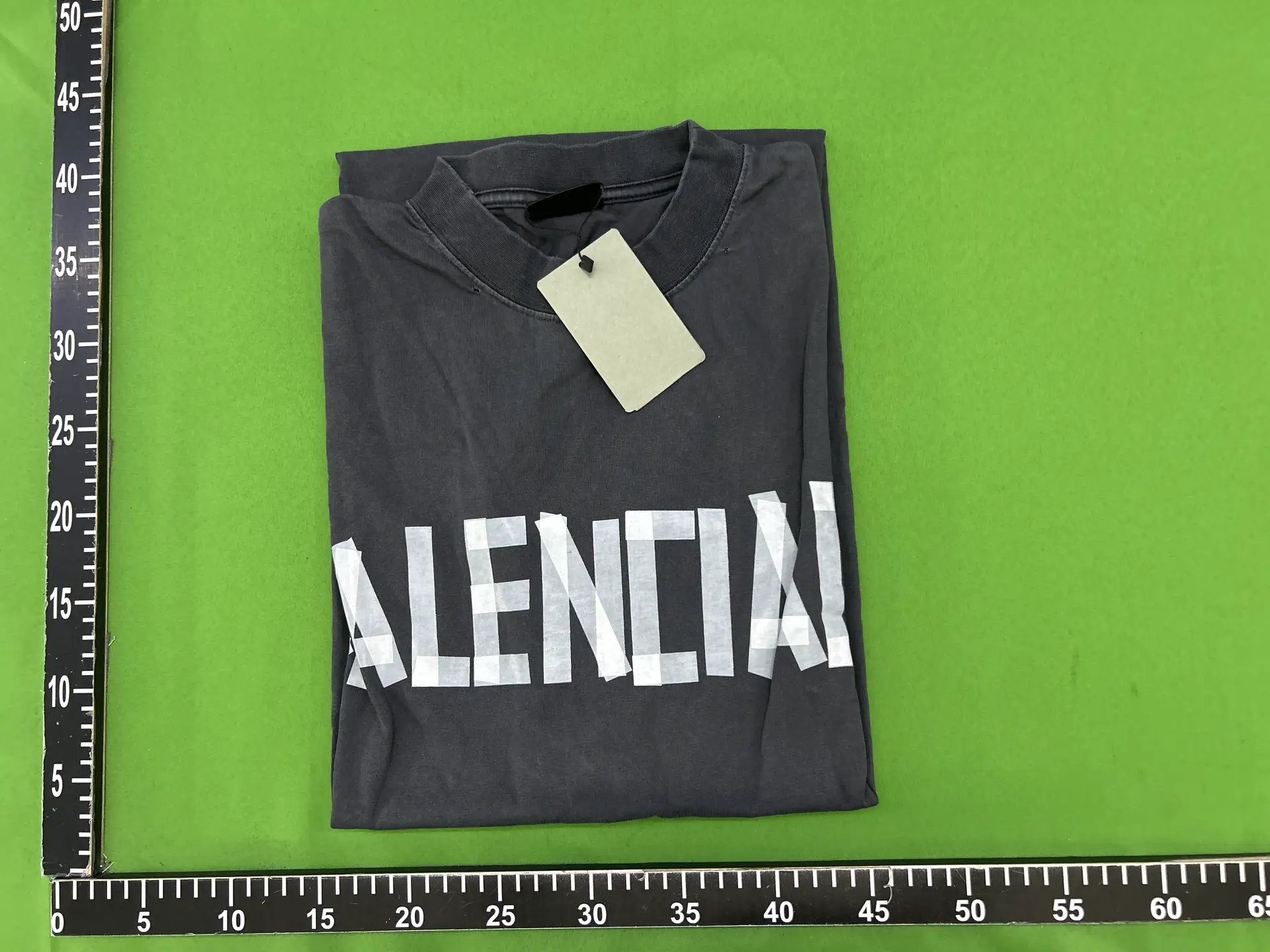 Printed T-shirt with embossed paper