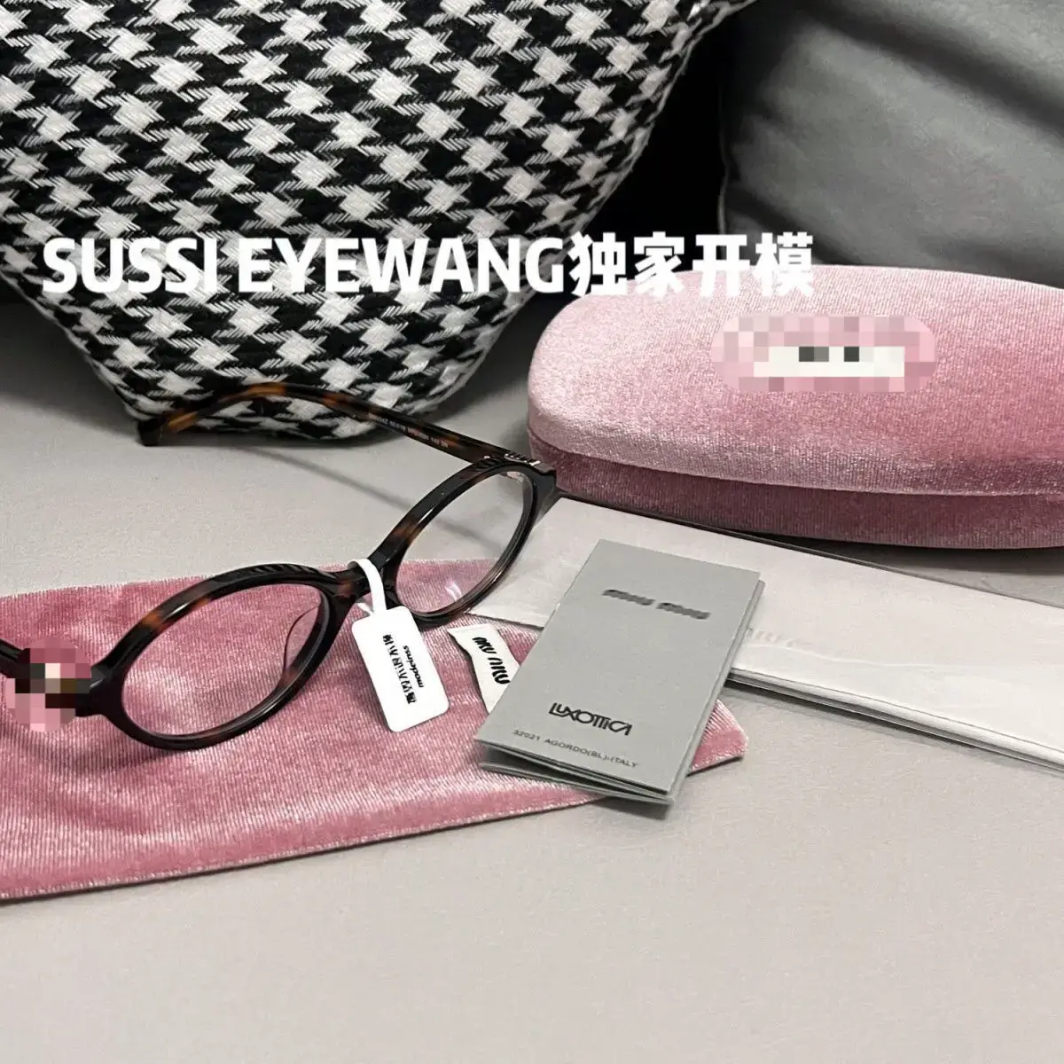 Miu Miu Oval Tortoiseshell Glasses