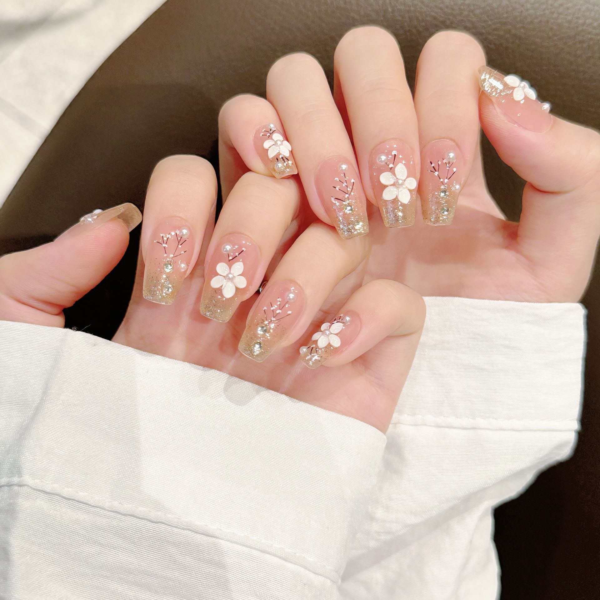 Rikman autumn and winter cat's eye milk tea cinnamon flower elegant temperament nail art handmade wholesale nail stickers fake