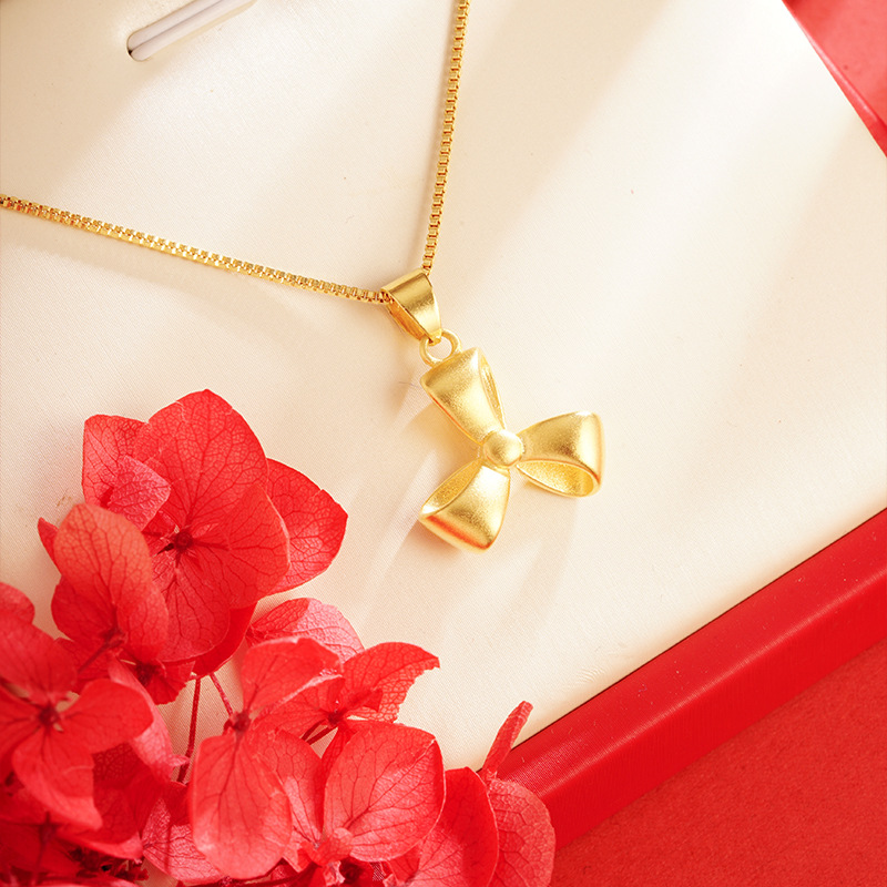Sand gold bow pendant women's simple fashion light luxury clover jewelry High sense Yiwu Accessories Wholesale