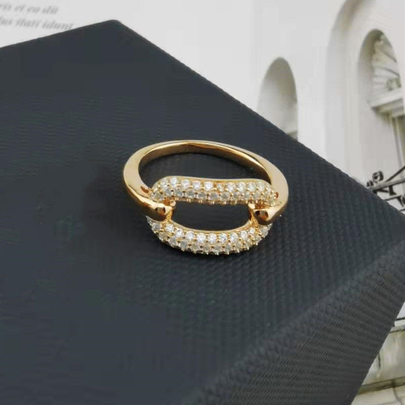 Copper inlaid zircon gold plating opening adjustable personality geometric lock ring fashion ring simple factory direct sales