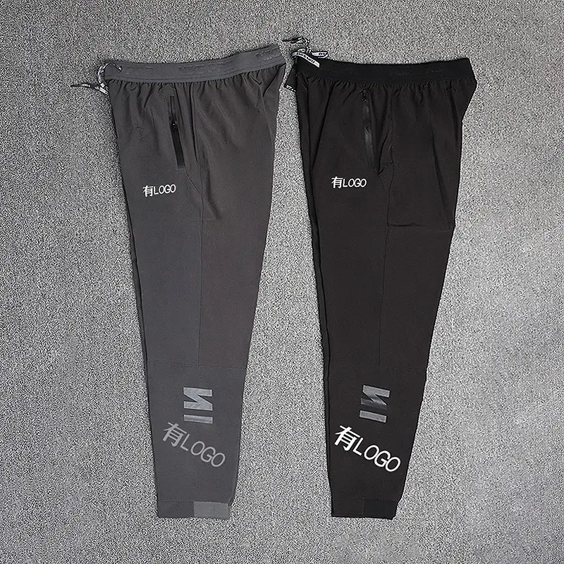 Foreign trade orders ice silk quick-drying sports track and field pants men's summer loose drawstring foot fitness leisure nine-minute pants casual