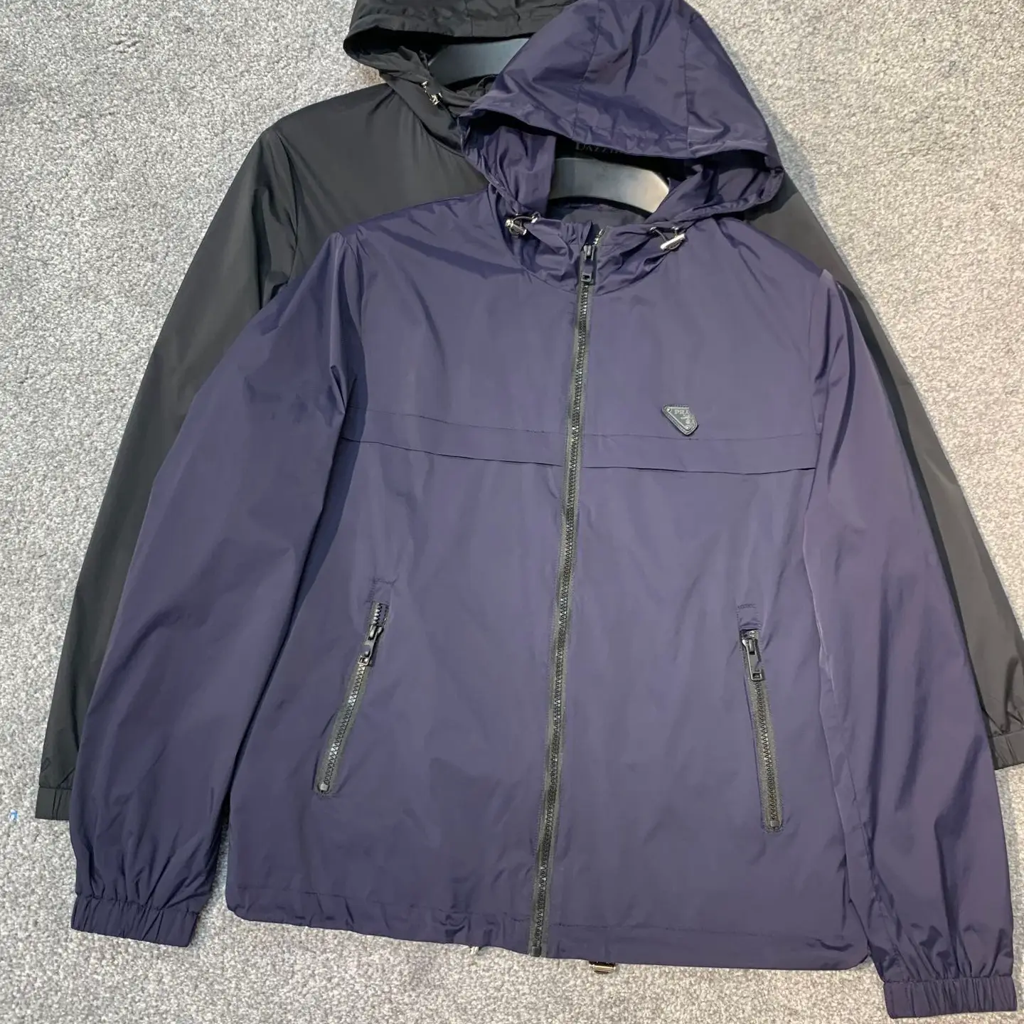 High version 2025 early spring new P family classic triangle label iron sign men and women hooded rushing jacket jacket