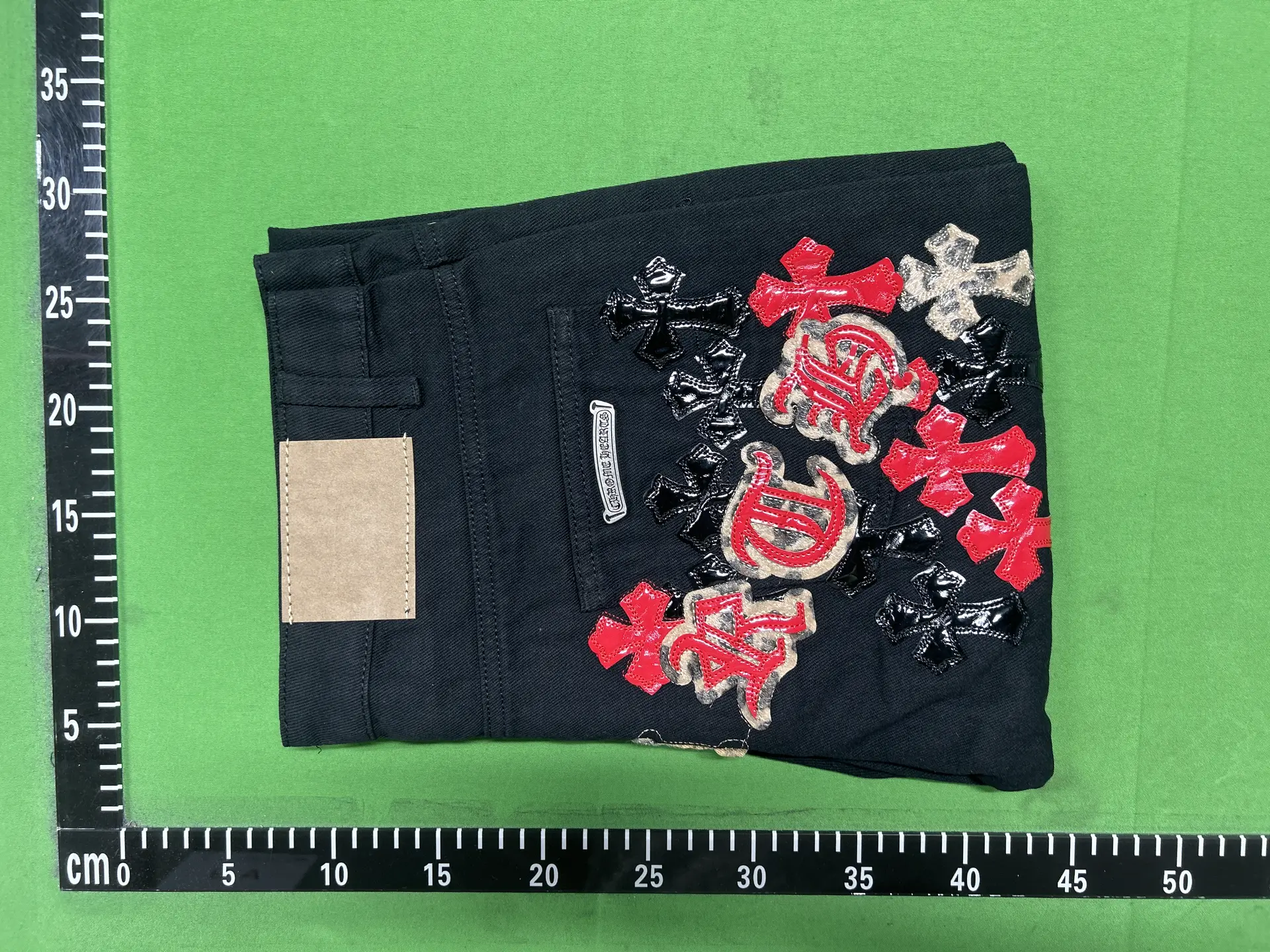 Chrome Hearts Black Jeans with Cross Embellishments