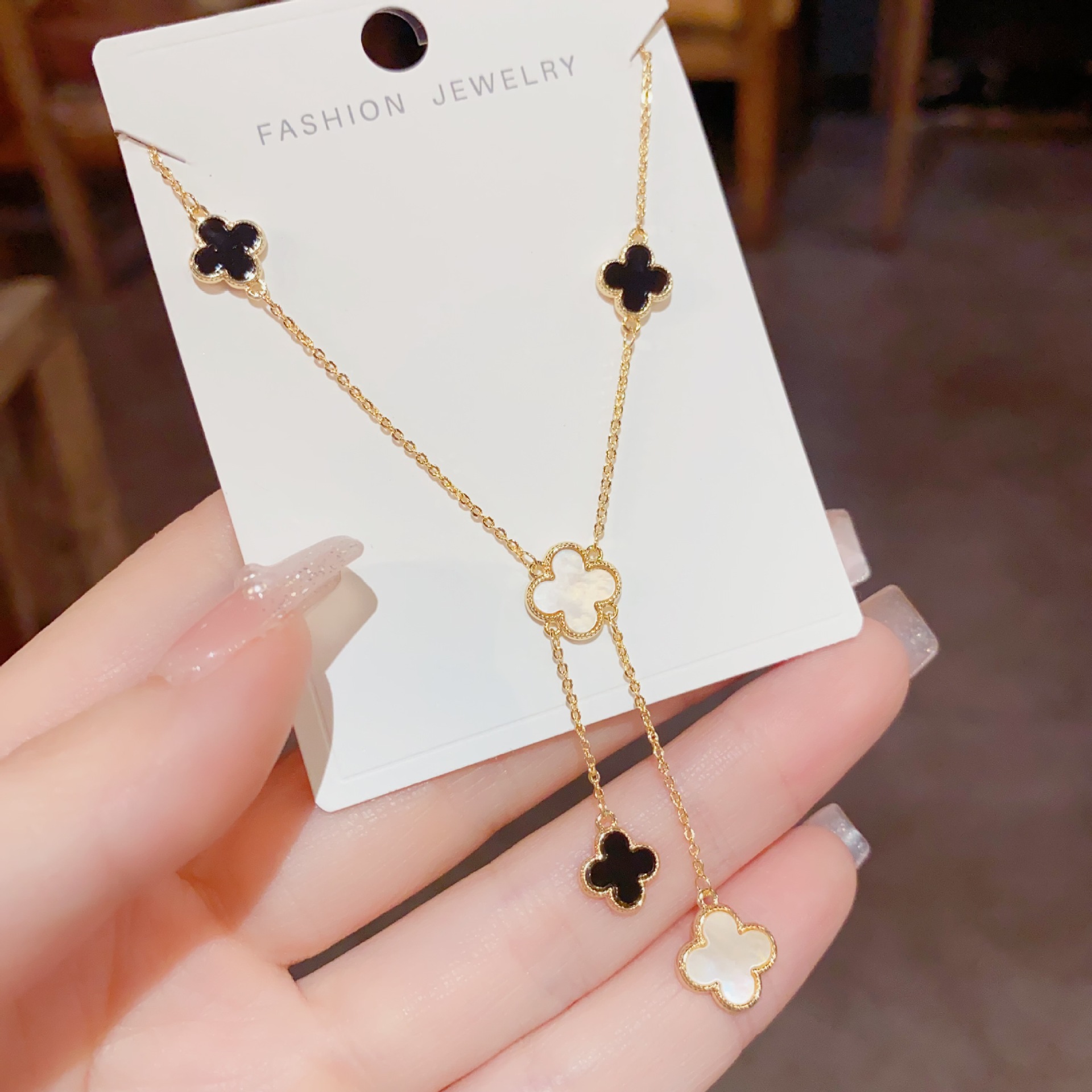 HS.DP exquisite luxury four-leaf flower shell tassel necklace niche design fashion temperament necklace wholesale