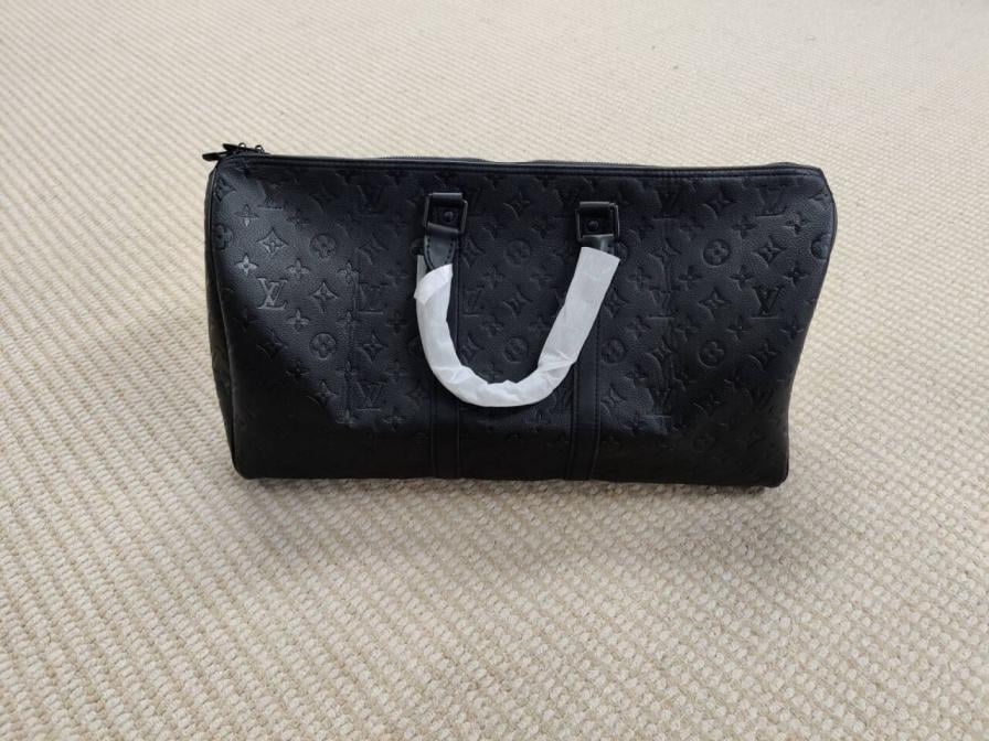 Louis Vuitton Monogram Embossed Keepall Bandouliere Black QC