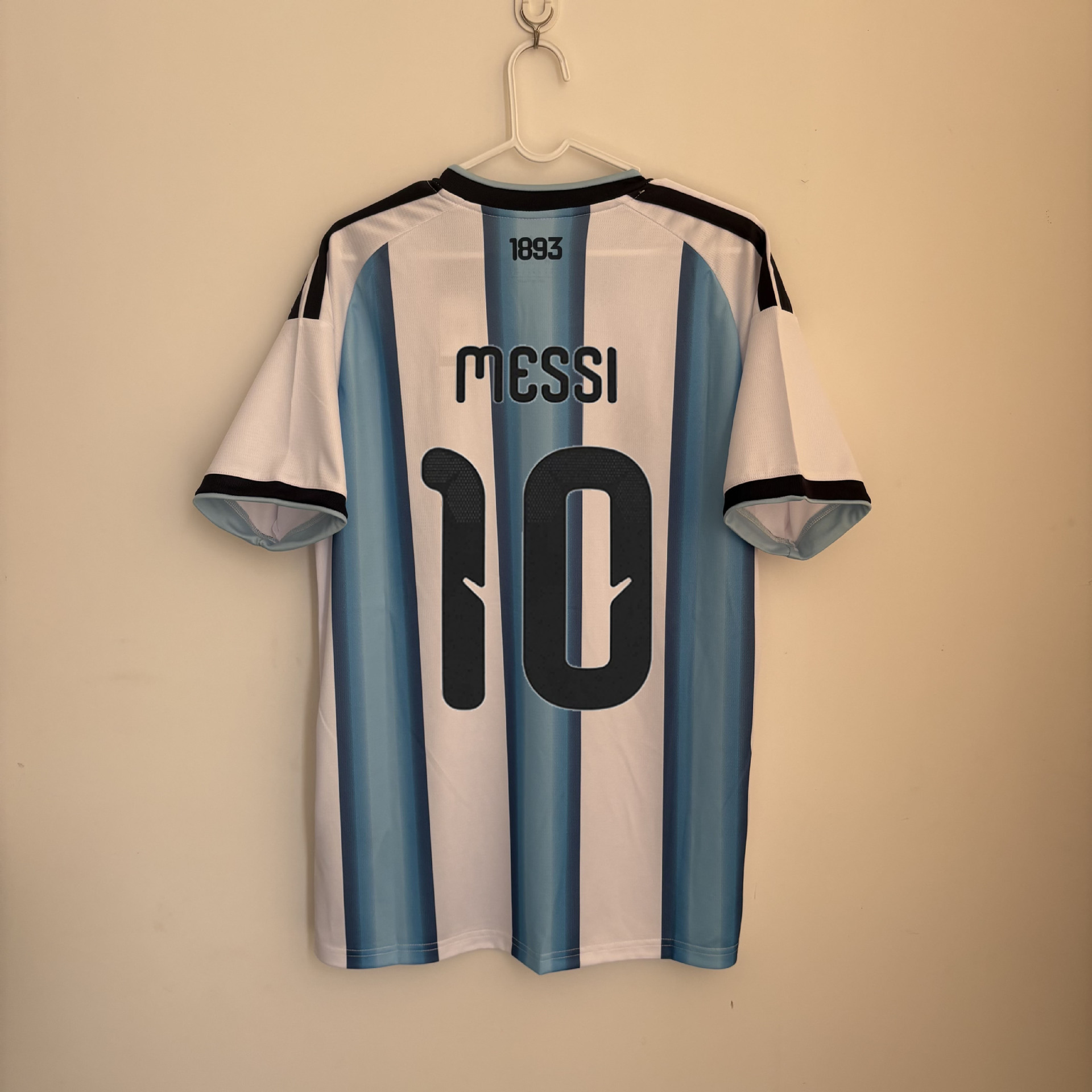 2026 Argentina Home World Cup Jersey No. 10 Messi No. 9 Alvarez No. 11 Di Maria QC photo from 1688 on Qualit.ly