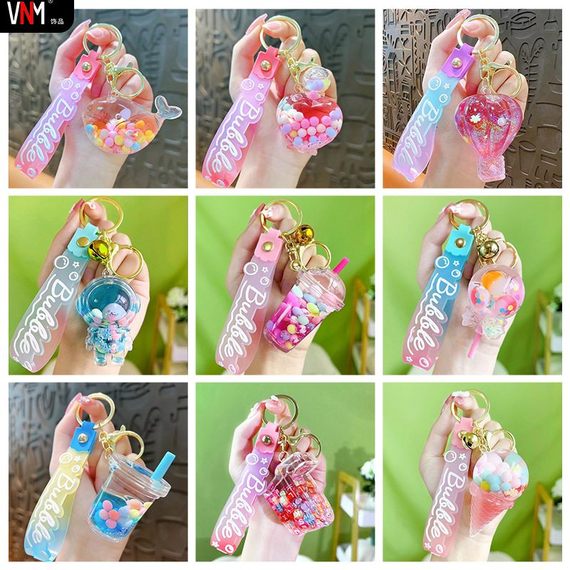 Acrylic quicksand bottle oil keychain gift wholesale schoolbag pendant doll cute quicksand pendant key chain