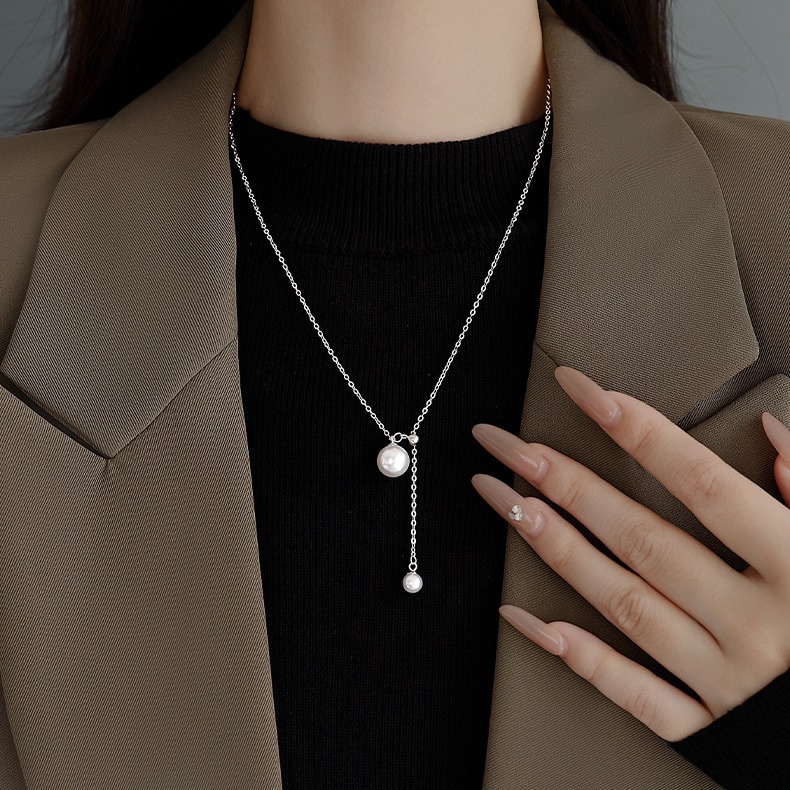 Titanium steel simple elegant pearl tassel necklace jewelry women's all-match niche high-grade non-fading clavicle sweater chain