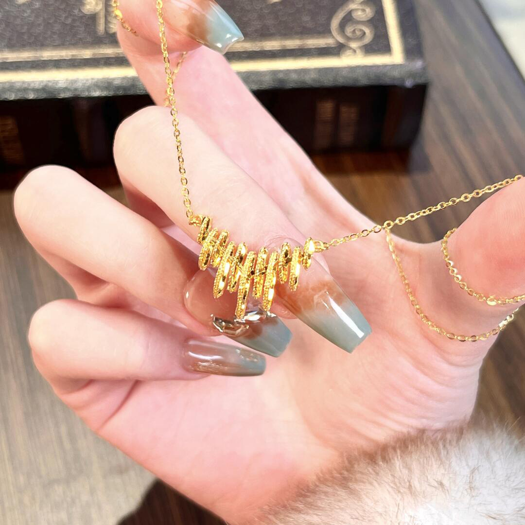 Golden Rhythm Note Necklace 2026 New Light Luxury Niche Design Titanium Steel Non-Fading Clavicle Chain Jewelry Customization