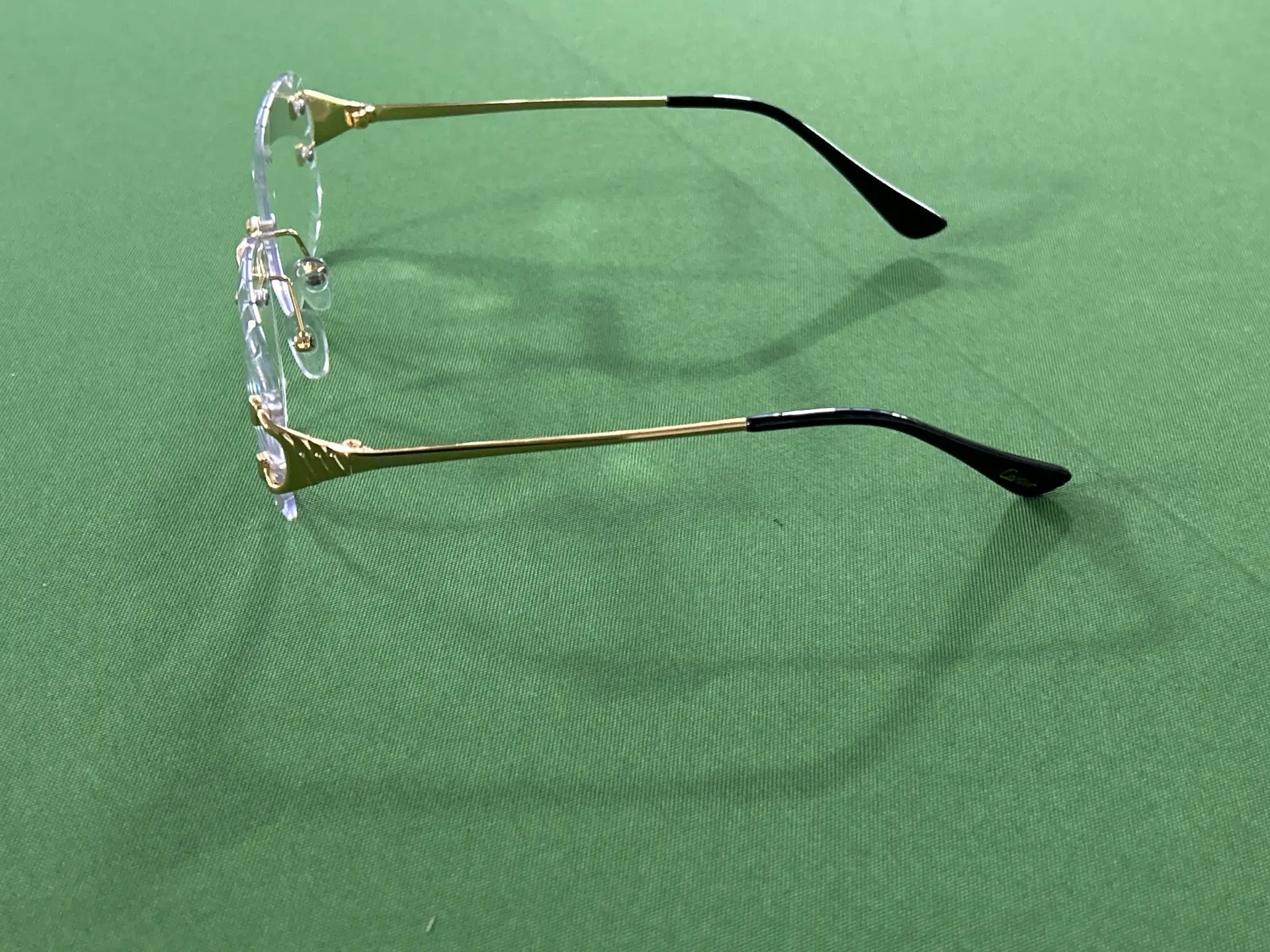 Cartier rimless gold glasses
