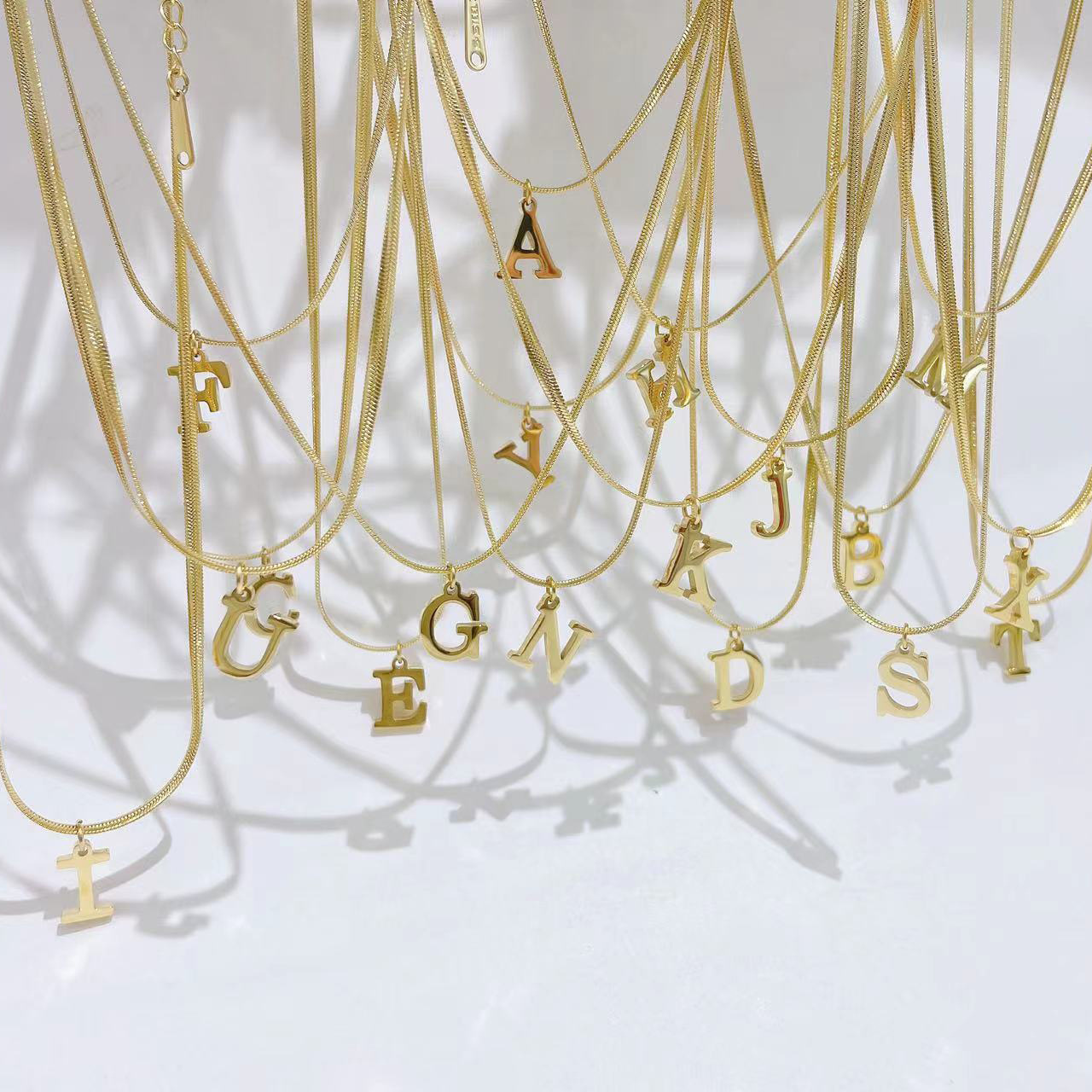 26 English Letter Necklace Titanium Steel Non-Fading Female Niche Design 2024 Douyin Same Style Clavicle Chain Snake Bone Chain